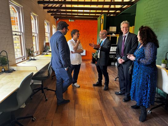 A group of guests tour the upper floor of the Old Wine Warehouse in Ramsgate, now refurbished to offer hot desk space