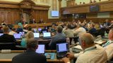 A wide view of the council chamber at County Hall in Maidstone during the full council meeting showing Members