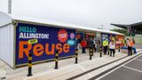 The purple exterior of the Allington HWRC Reuse shop with people standing outside