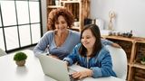 Girl with Learning Disablity using laptop