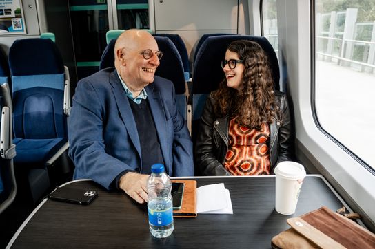 Andrew and adoptd daughter Carla on a train