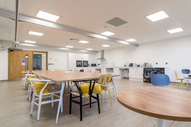 A large open plan adaptable working space at The Point with specialist features such as a riser kitchen and track and hoists.