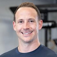 Headshot of Tom Tsangarides, Director and Founder of Inclusive Sport