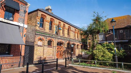 External view of the red brick Old Wine Warehouse in Ramsgate