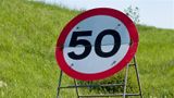 A photo of a temporary 50mph sign. 