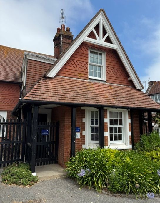 A red brick Victorian building called The Lodge, at Stone Bay School