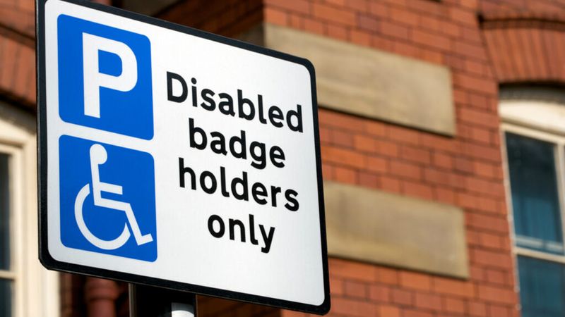 Image of a disabled blue badge holder parking sign