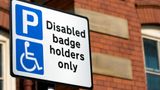 Image of a disabled blue badge holder parking sign