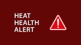Heat health alert white text shown on red warning background