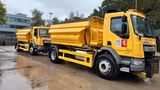 Image of a yellow gritter parked up on the road