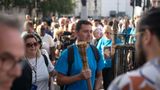 A man carrying the Baton of Hope 