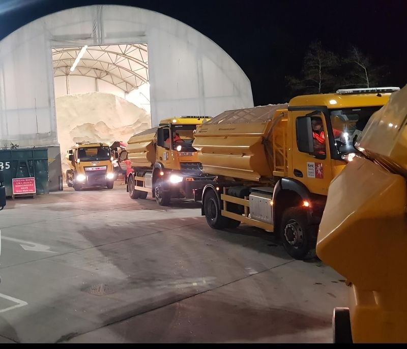 KCC gritting vehicles head out of their depot into the night to treat roads 