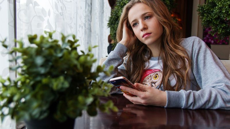 Young girl looking upset