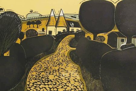Linocut by Graham Clarke, showing a scene with trees, fields, oast houses and a cobbled road in black and yellow tones