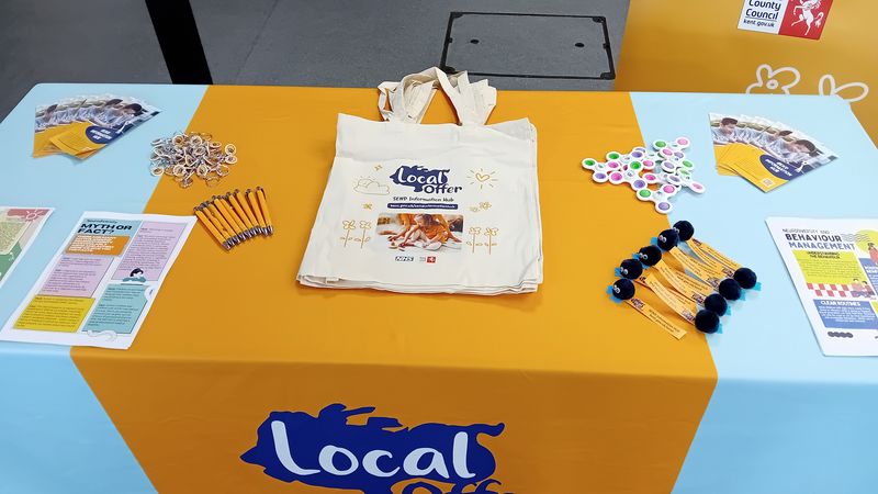 A close up of a table displaying information about Kent's Local Offer at a SEND Roadshow