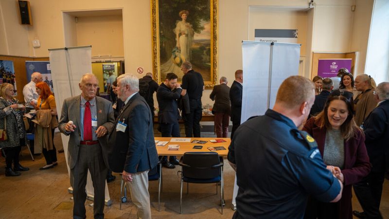 A packed and busy exhibition room