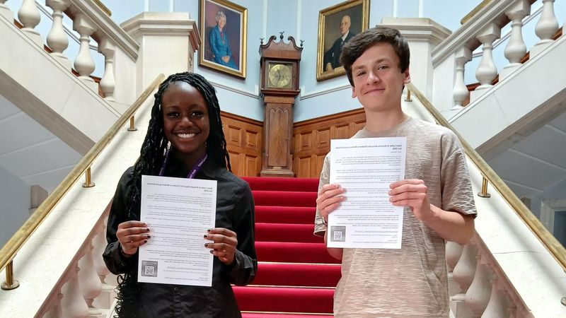 KYCC Chair, Shae and Vice Chair, Seb with the Open Letter to Schools.