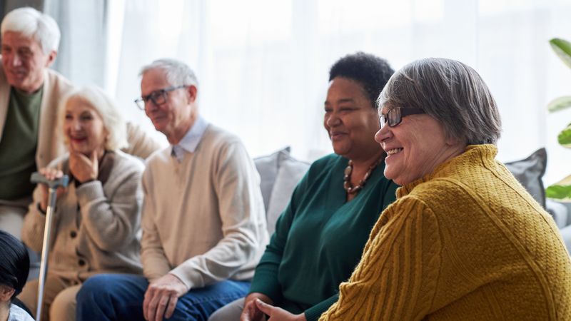Group of older people talking 