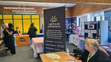 A variety of stalls set up at the SEND Roadshow in Folkestone with professionals speaking to visitors about their services