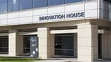 Innovation House building, a building located in Discovery Park with a natural stone front and large glass windows