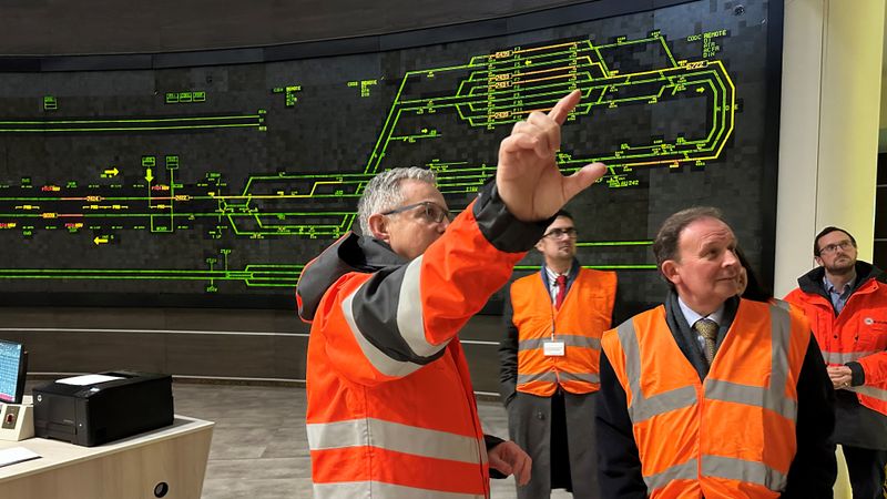 Leader of KCC Roger Gough in a hi-vis jacket is in the Eurotunnel control centre being shown the changes being made to mitigate the new border checks coming into force