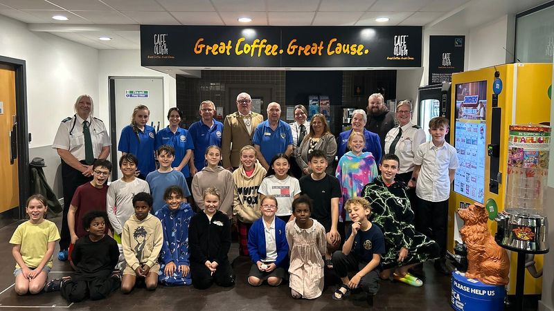 A group picture of young people, community wardens and experts at Gravesham Lifesaving Club at Fairfield Leisure Centre in Dartford  