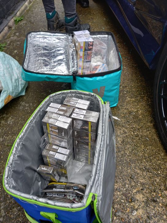 Cigarettes being concealed in food delivery bags