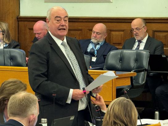 Deputy KCC Leader Peter Oakford stands to address the budget meeting at the council chamber in Maidstone