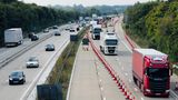 Shot from a motorway bridge showing the Operation Brock contraflow traffic management system with lorries heading in single file towards Dover